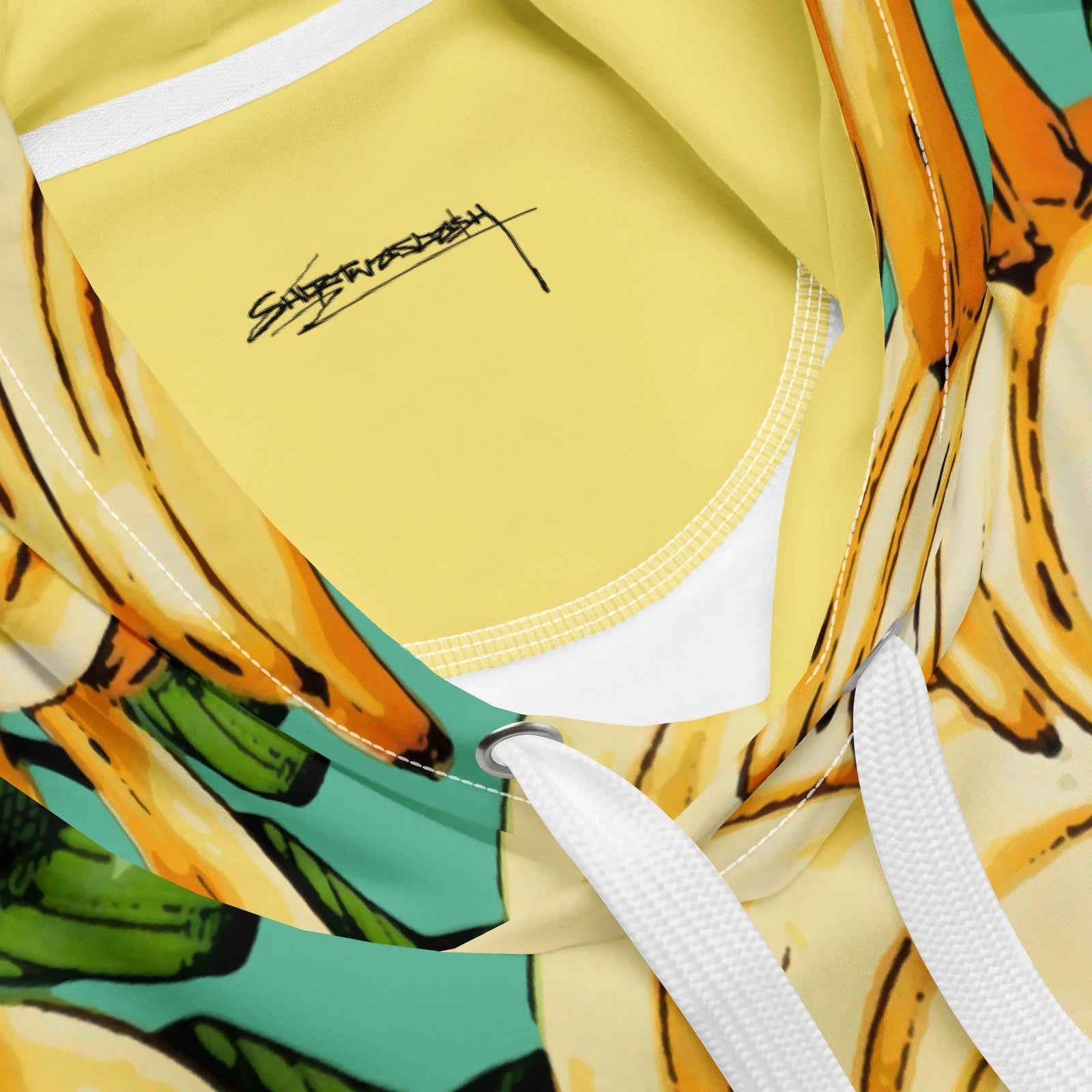Banana Pattern Hoodie in Tropical Mint Smoothie. OEKO-TEX® 100, REACH Compliant, GRS Certified.