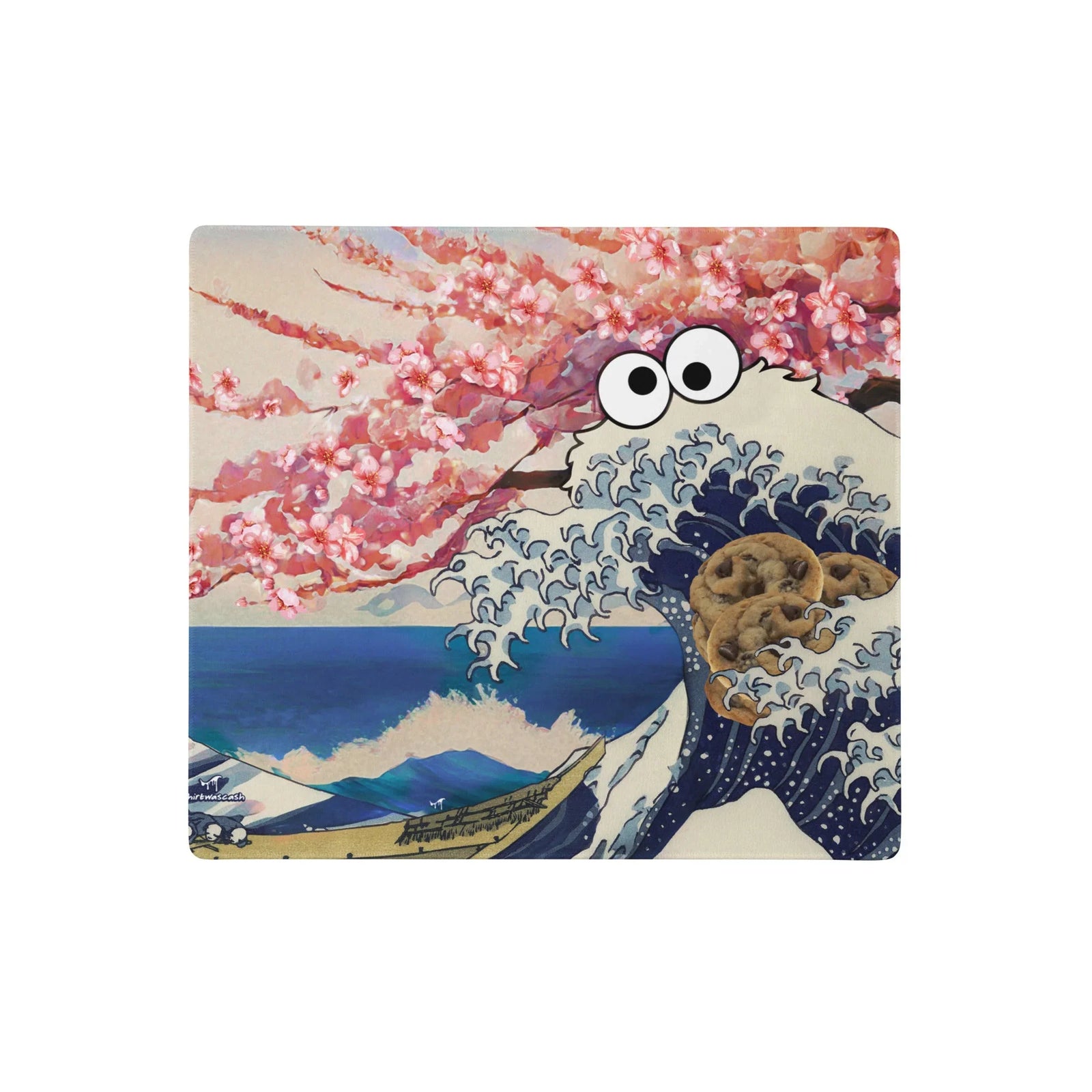 Cookie Wave Blossom Desk Mats - The anthropomorphized indigo (#2B3A67) wave crest transforming into iconic shaggy blue fur, punctuated by erratic googly eyes locking onto the golden dough (#C19A6B) prize.