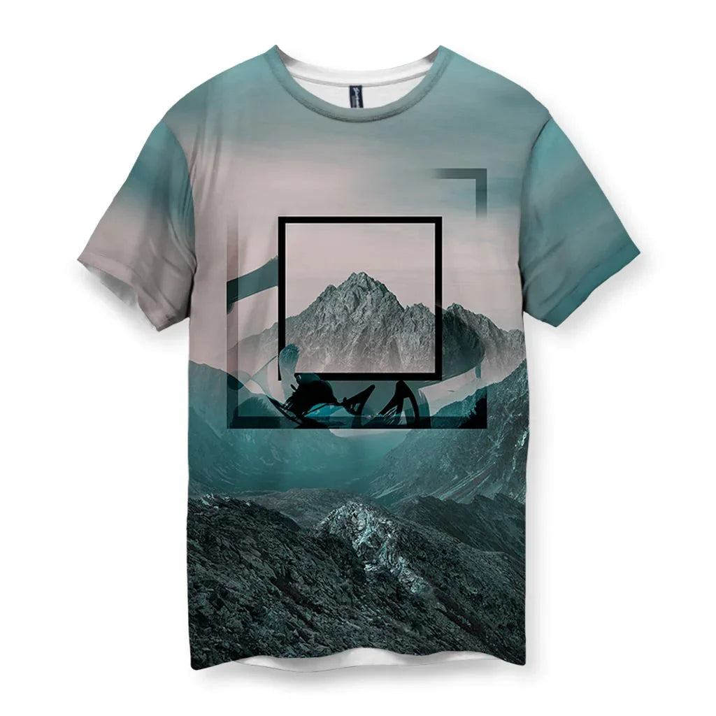 This tee showcases a dramatic mountain vista with jagged charcoal rocks transitioning into pale alpine mist and glacial teal sky. Contact us with accessibility feedback, we'd love to help!