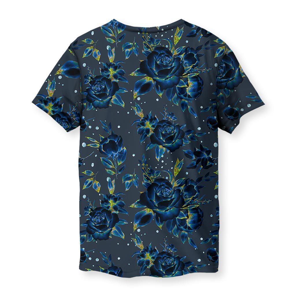 Holographic Flowers T-Shirt - The distressed "BLOOM" text in bone white (#E3DAC9) superimposed over neon chartreuse (#DFFF00) and electric cyan petal glints, creating a radioactive-organic contrast against the midnight slate (#2F3B4C) backdrop