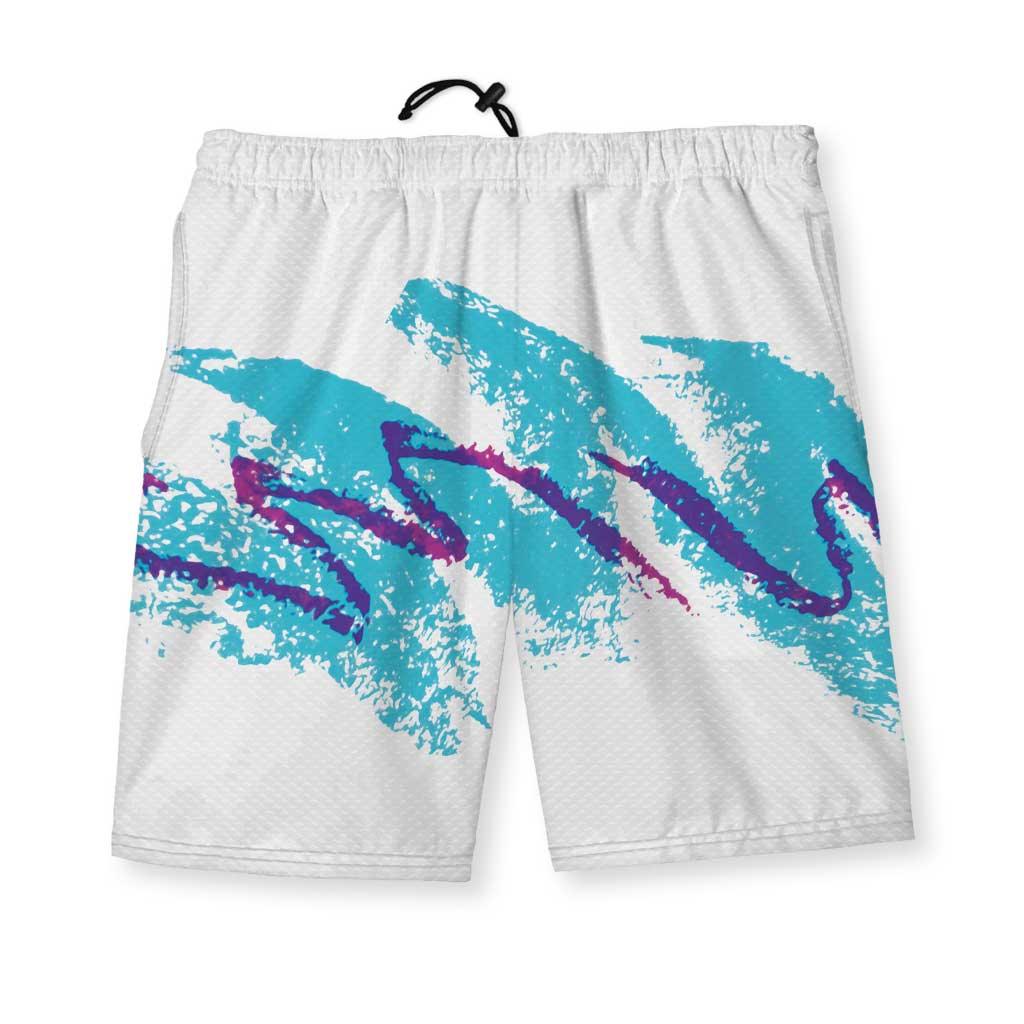 White athletic shorts explode with a retro '90s design—electric turquoise brushstrokes sweep across the legs like mall fountain water, while jagged violet zigzags (pure grape soda energy) slash through the composition. Contact us with accessibility feedback, we'd love to help!