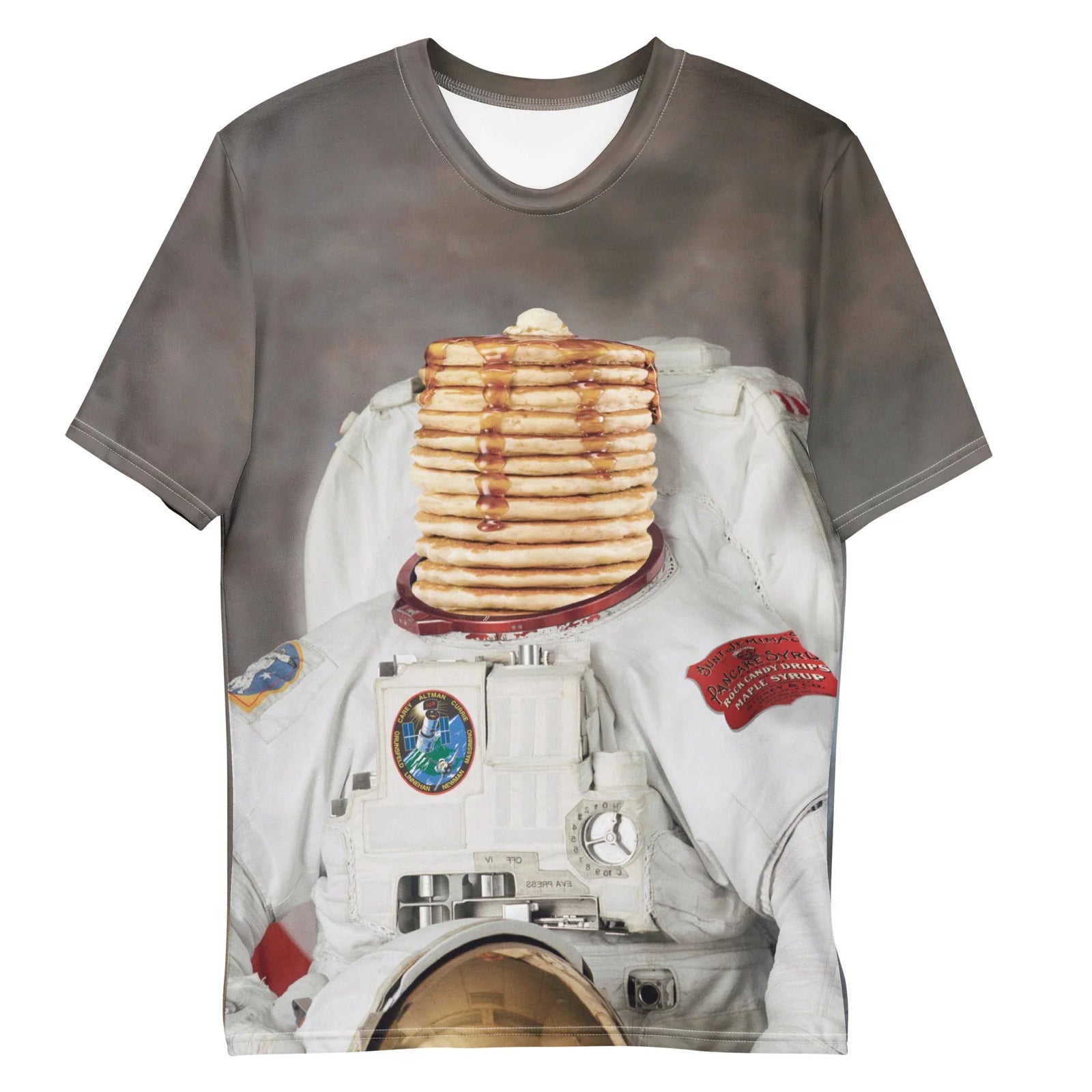 A surreal, high-definition graphic replaces a standard helmet with a massive stack of golden-brown hotcakes rising from a realistic lunar dust white astronaut suit. Contact us with accessibility feedback, we'd love to help!