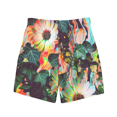 Colorful recycled swim trunks with large floral and leaf print on white background