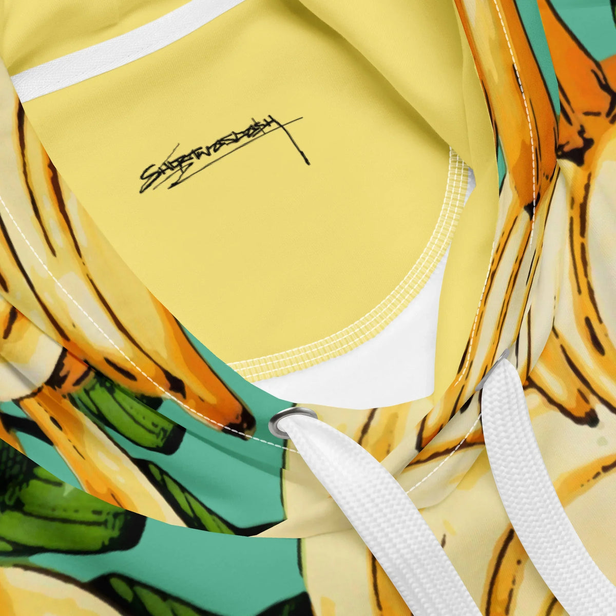 Banana Pattern Hoodie in Tropical Mint Smoothie. OEKO-TEX® 100, REACH Compliant, GRS Certified.