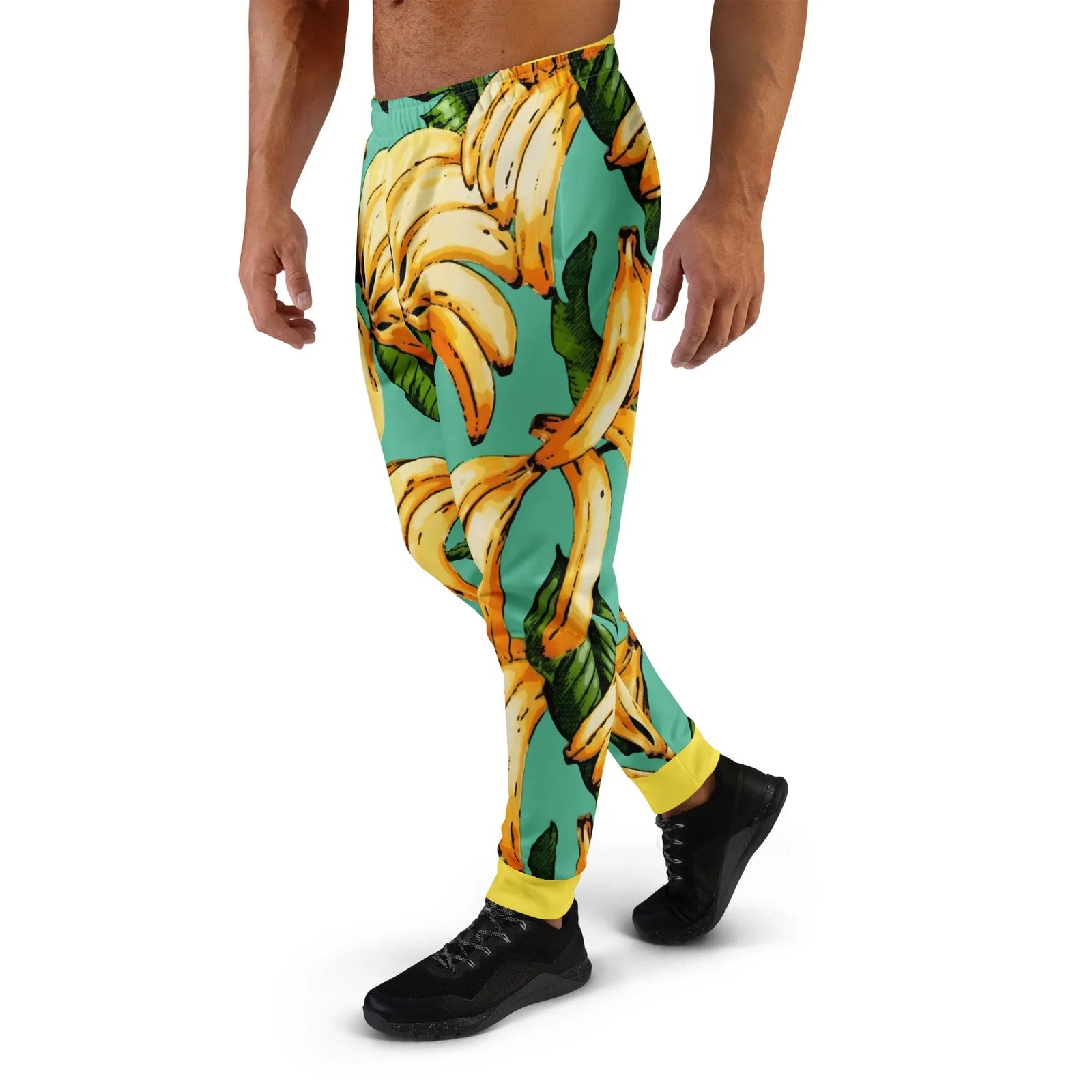 Banana Pattern Joggers in Tropical Turquoise Harvest. OEKO-TEX® 100, REACH Compliant, GRS Certified.