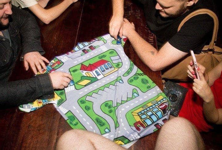 Car Carpet City Women's Tee in Nostalgic Playmat Green. OEKO-TEX® 100, REACH Compliant, Zero-Wastewater Printing.