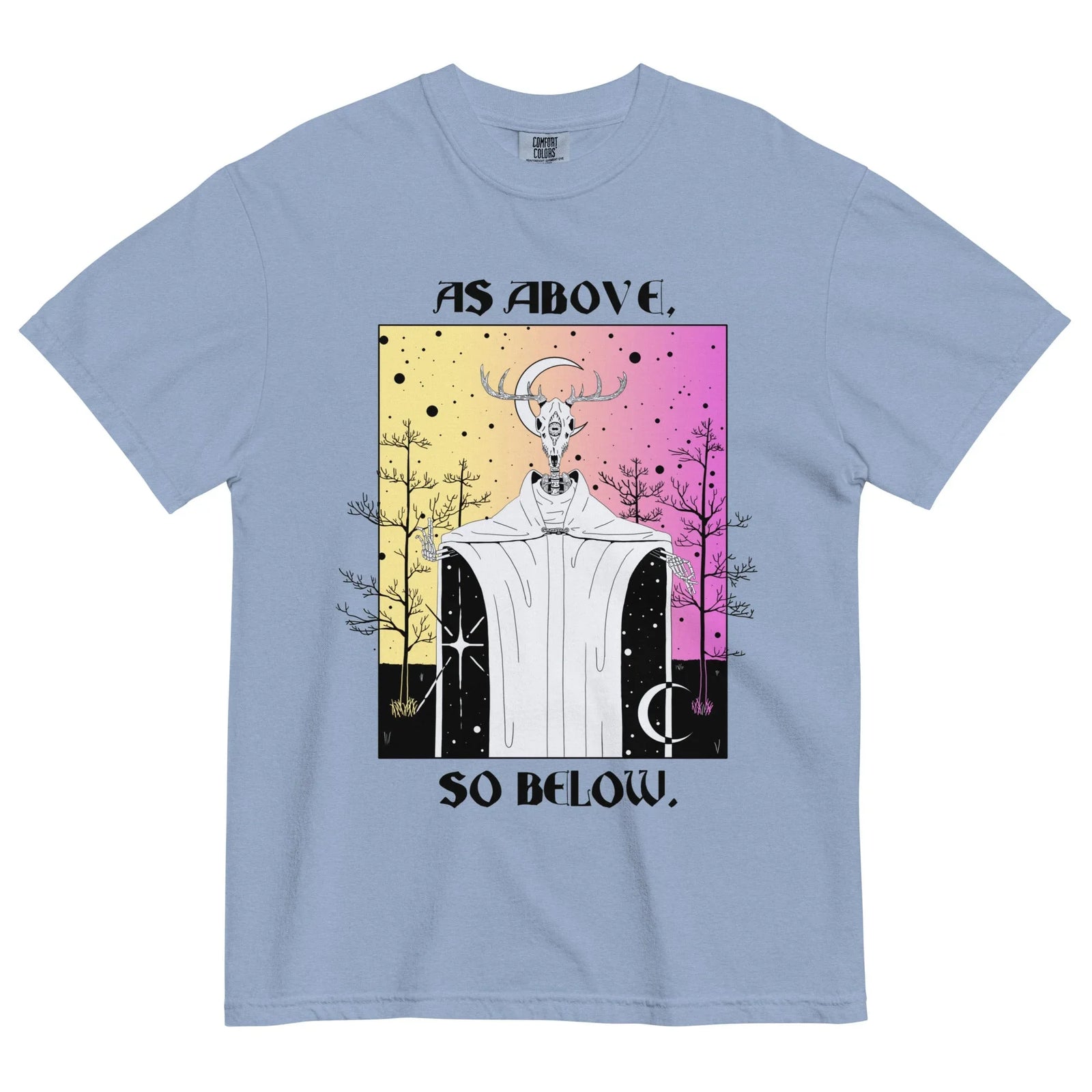 Cosmos T-Shirt - The antlered deer skull featuring a third eye symbol, framed by the hermetic maxim "AS ABOVE, SO BELOW" in gothic lettering against a gradient from warm sunset yellow (#FBE18A) to bold cosmic fuchsia (#E879B9)