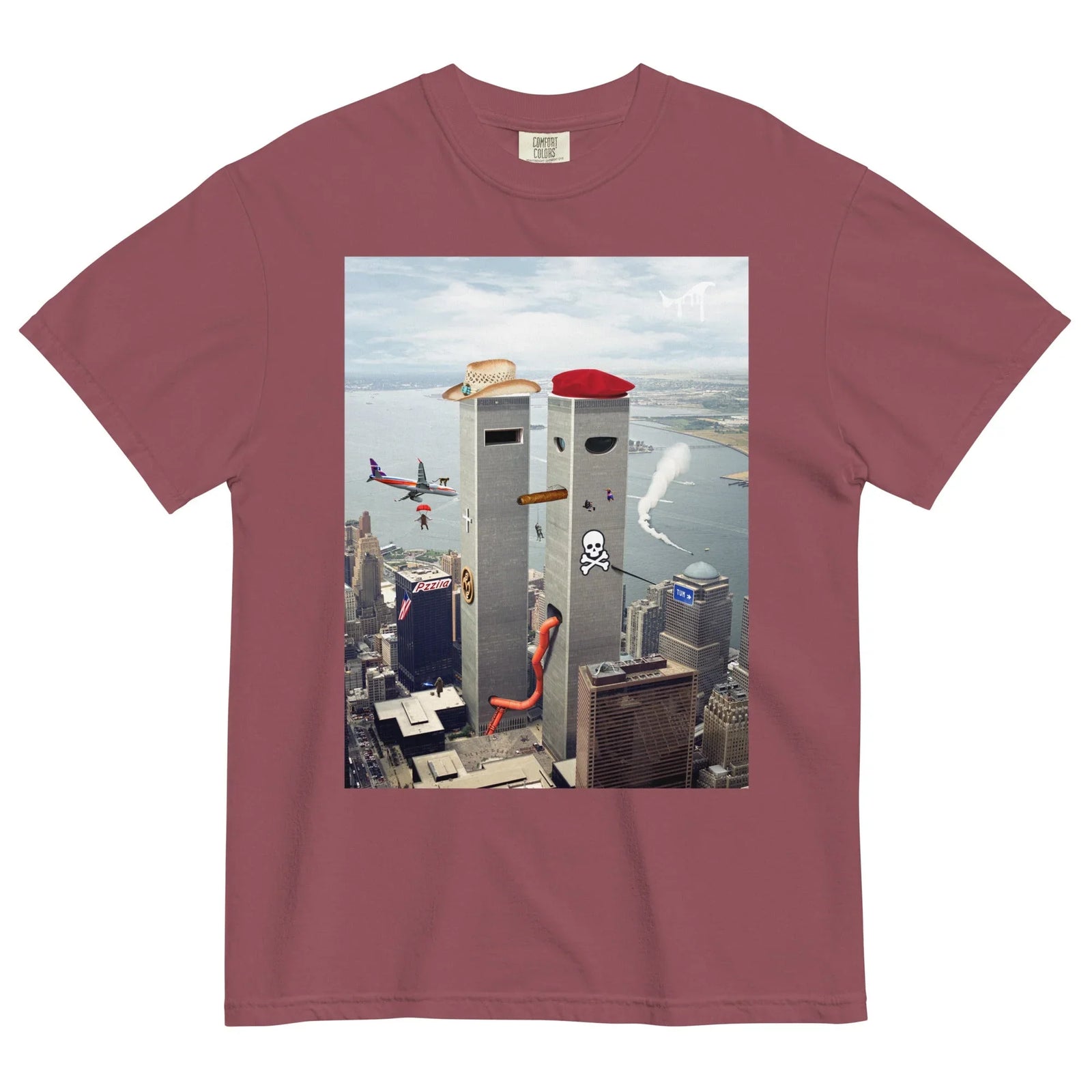 Funhouse 911 T-Shirt - The anthropomorphized grey monoliths wearing a beige (#D2B48C) western hat and crimson (#DC143C) beret superimposed over the recognizable skyline, with chaotic elements like a safety orange (#FF4500) slide and approaching aircraft evoking surreal, meme-inspired absurdity