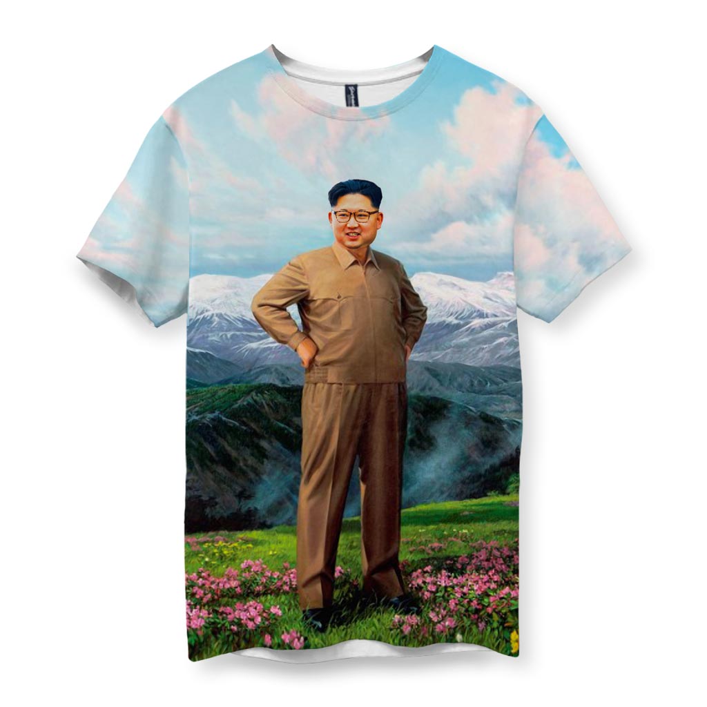 T-shirt with a printed design of Kim Jong Un standing in a scenic landscape with mountains and flowers.