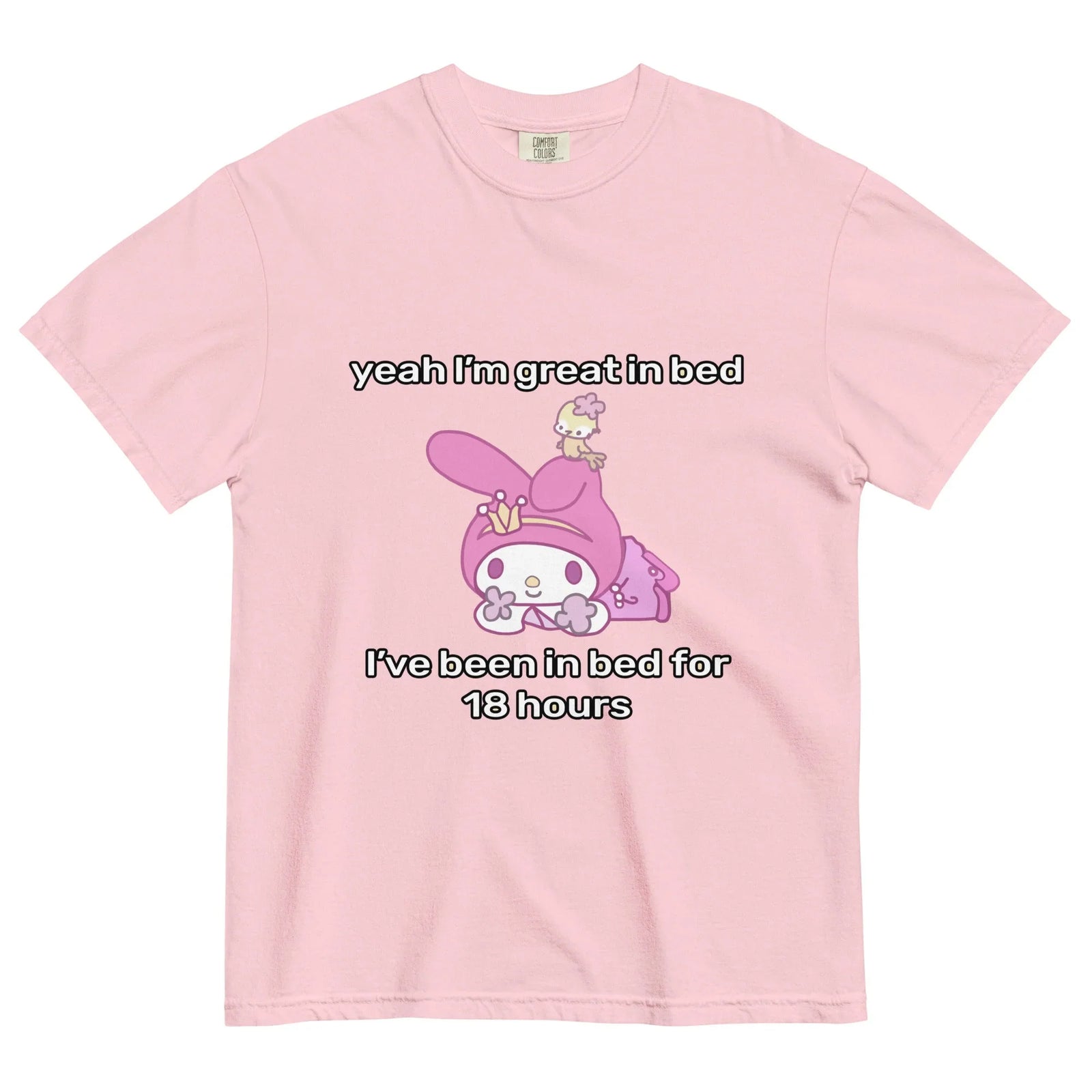 A gentle pastel blush pink backdrop highlights a central "kawaii" graphic featuring a prone white rabbit in a berry magenta hood (complete with a tiny yellow bird companion). Contact us with accessibility feedback, we'd love to help!