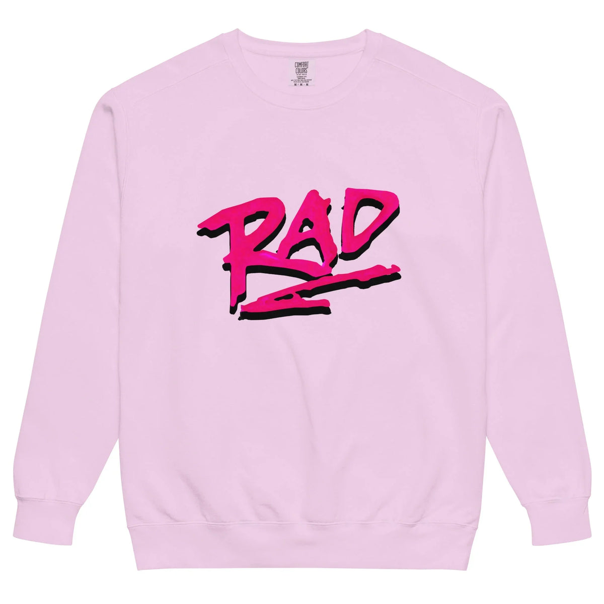 A soft pastel pink crewneck showcases "RAD" in jagged, graffiti-style lettering across the chest—vibrant magenta with a bold black drop shadow that creates a striking 3D pop. Contact us with accessibility feedback, we'd love to help!