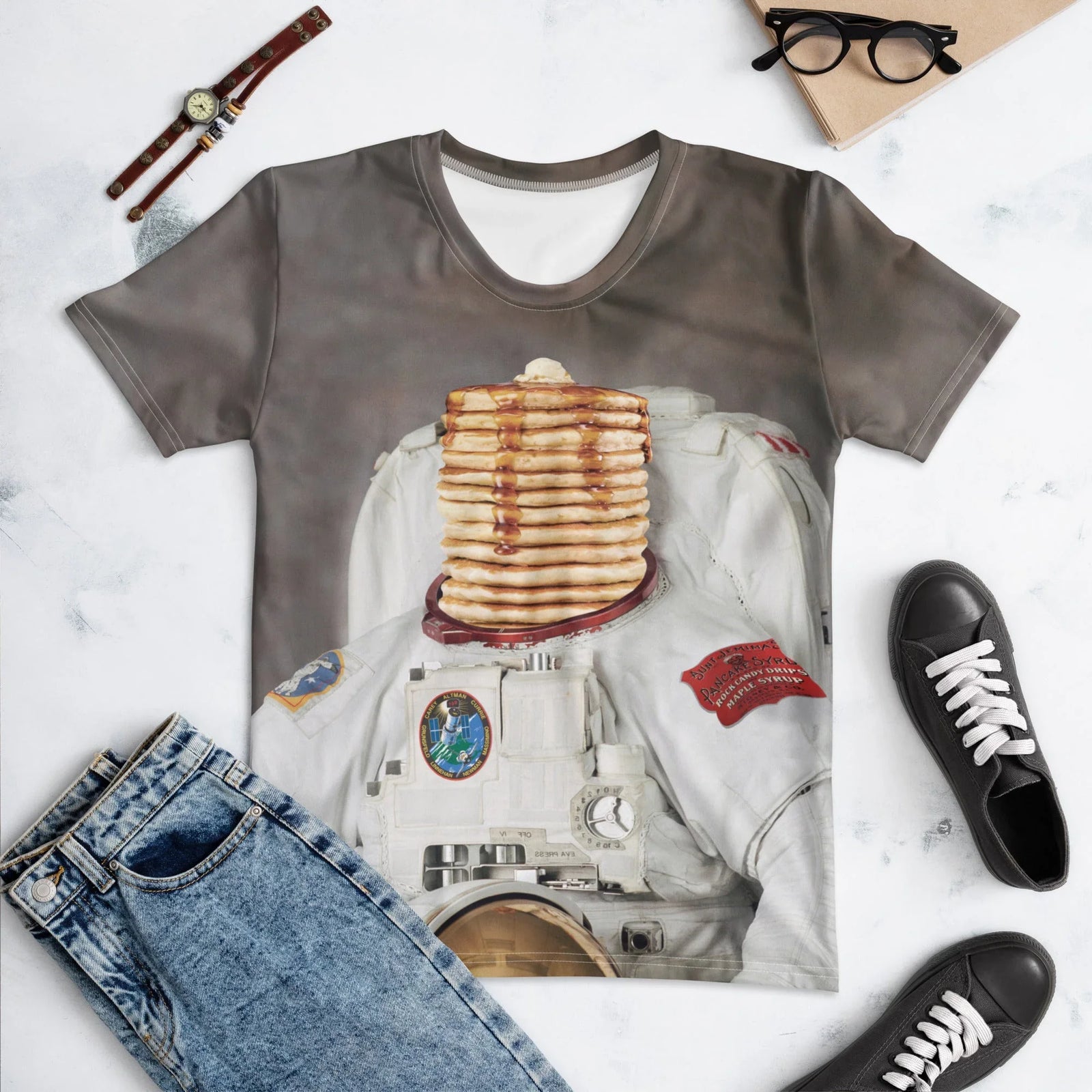 This surreal, high-definition graphic displays a lunar white astronaut suit set against a smoky, dark taupe backdrop. Contact us with accessibility feedback, we'd love to help!