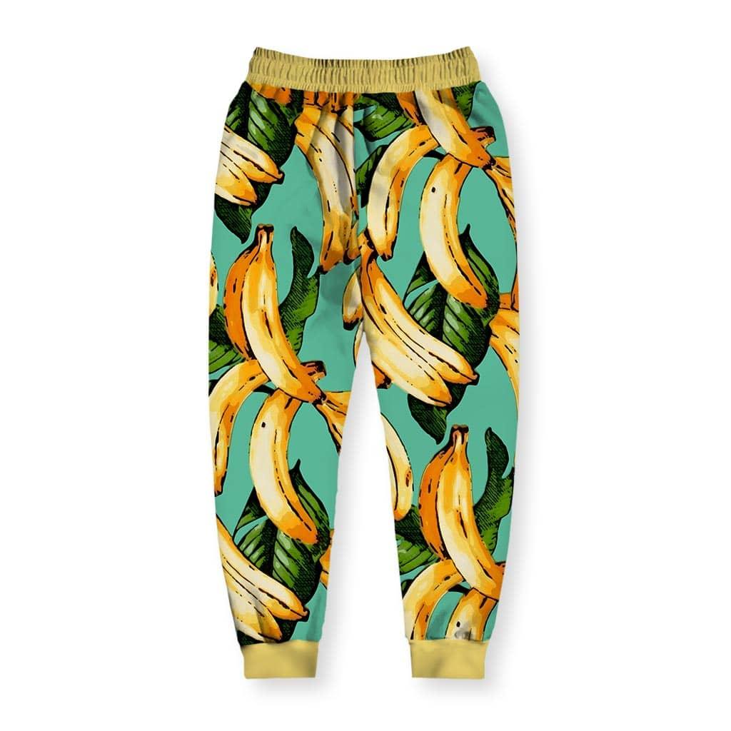 Banana Pattern Joggers - The specific high-contrast vibration between the aquatic turquoise (#66CDAA) backdrop and the comic-book style black hatching (#000000) on the sun-ripened fruit (#FFD700).