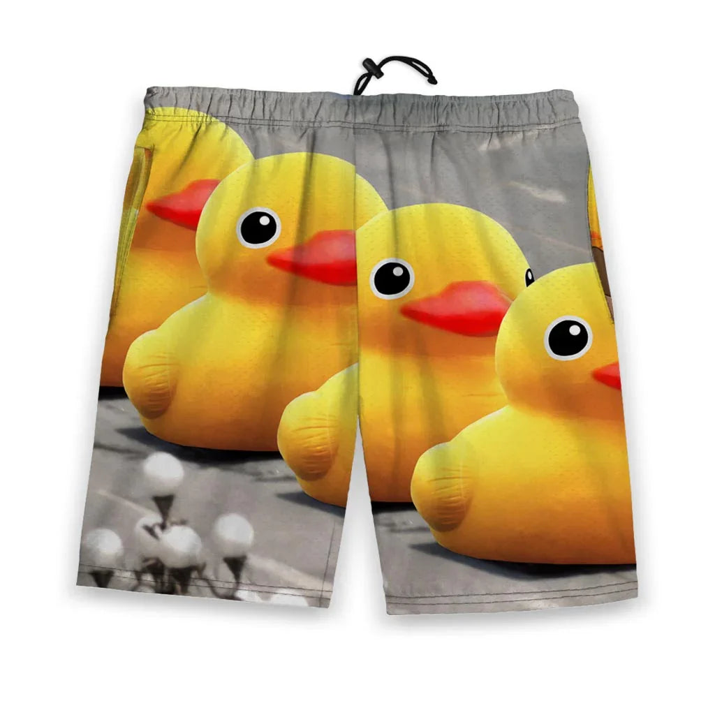 These men's gym shorts showcase a satirical convoy of three gigantic yellow rubber duckies marching down an urban street, their glossy orange bills and innocent black eyes dominating the composition. Contact us with accessibility feedback, we'd love to help!